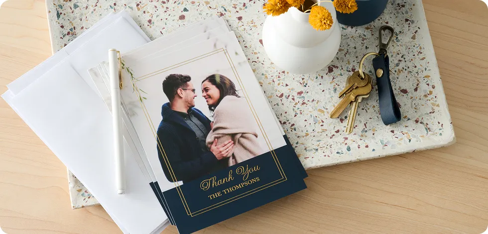 Graduation announcements with gold foil text